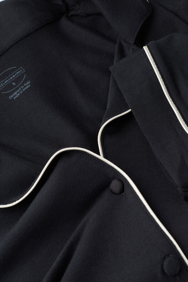 Modaalista valmistettu lyhythihainen napituspaita Modaalista valmistettu lyhythihainen napituspaita