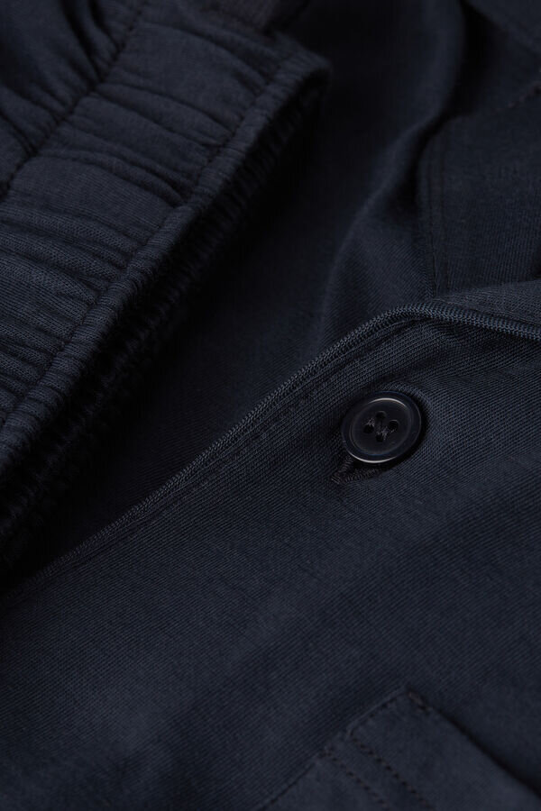 Painonappikiinnitteiset pitkät pyjamat korkealaatuisesta puuvillasta Painonappikiinnitteiset pitkät pyjamat korkealaatuisesta puuvillasta